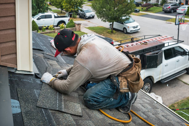 Professional Flat Roof Repair technician working in Raynham, MA